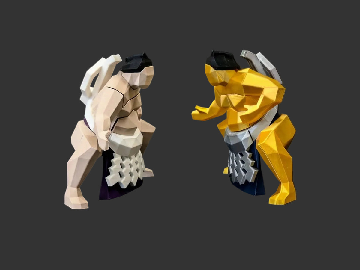 Two low-poly 3D figurines posed facing each other on a dark studio background. One figurine is beige and white with black and purple accents, and the other is yellow, silver, and blue.